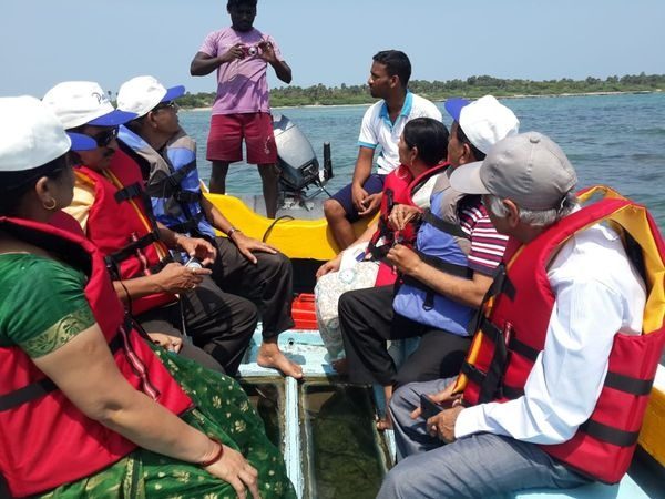 Guests on a glass-bottom boat ride